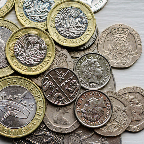 pile of uk coins
