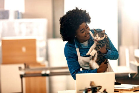 Happy woman with her cat. 