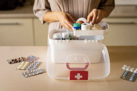 An illustrative photo of a woman storing her medicine correctly.