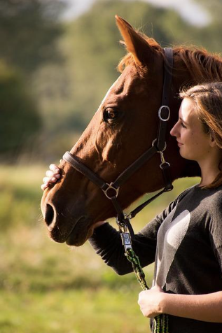 Picture of a woman and her horse.