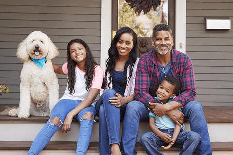 Happy family with dog