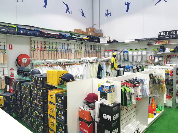 An image of the Western Sports Centre store, displaying a wide variety of high-quality cricket gear, including cricket bats, balls, gloves, helmets, pads, and accessories