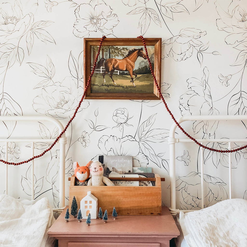 Renae Delicate Flowers, Pattern Wallpaper graces the walls of a bedroom adorned with a pristine white aesthetic.