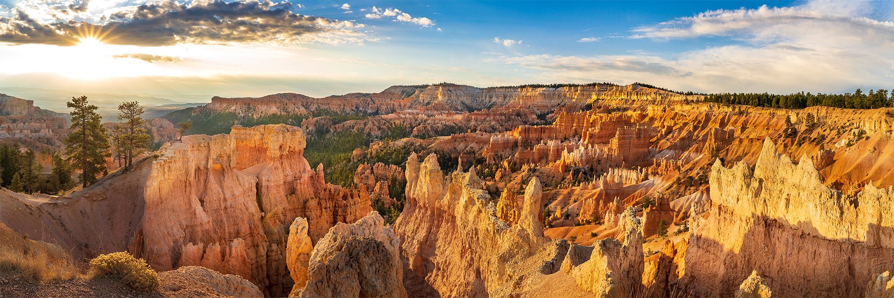 Office canvas art of the jagged tan rocks of Bryce Canyon National Park at sunrise.