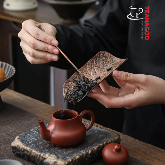 https://cdn.shopify.com/s/files/1/0330/5917/6493/products/Alloy_Copper_Autumn_Leaf_Tea_Holder_Cha_He_Handmade_Tea_Accessories_CH03-02.jpg?v=1668581726&width=533