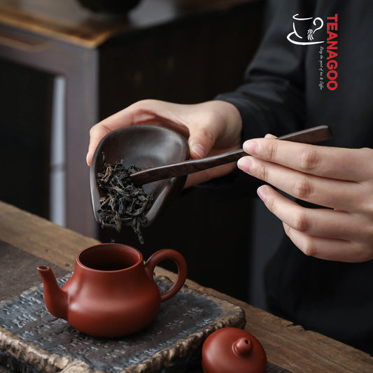 https://cdn.shopify.com/s/files/1/0330/5917/6493/products/Ebony_Wood_Cha_He_Handmade_Tea_Holder_Tea_Accessories_CH02-02.jpg?v=1668581690&width=533