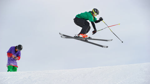 Skier hitting a jump