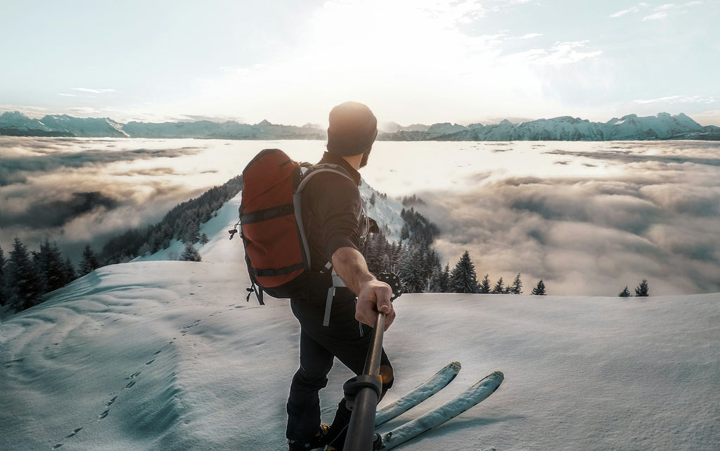 Skier with ski backpack