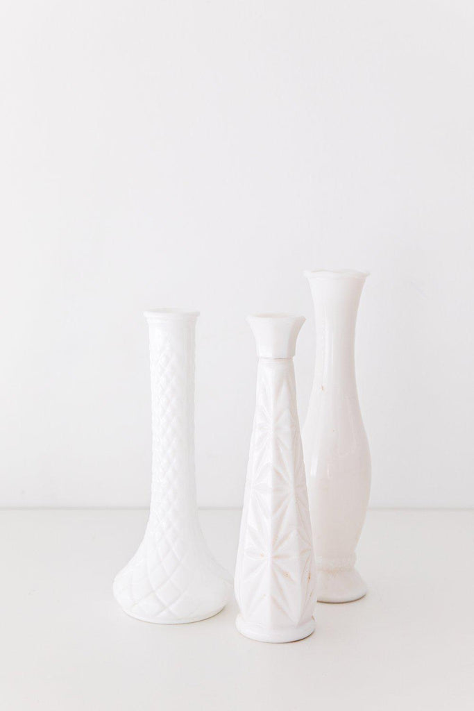 https://cdn.shopify.com/s/files/1/0331/1763/4698/products/vintage-milk-glass-vase-vintage-goods-heirloomed_1024x1024.jpg?v=1643383447