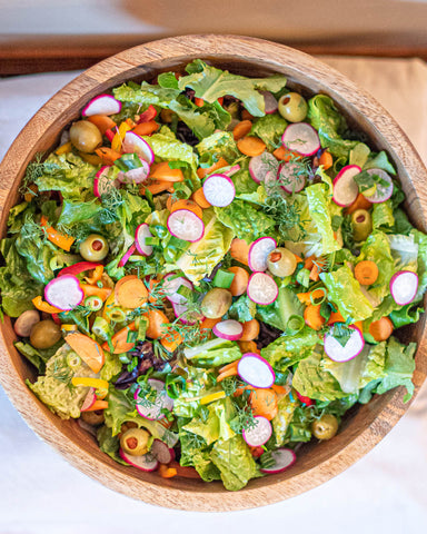 Summer Greens & Veggies Salad in a Wooden Bowl