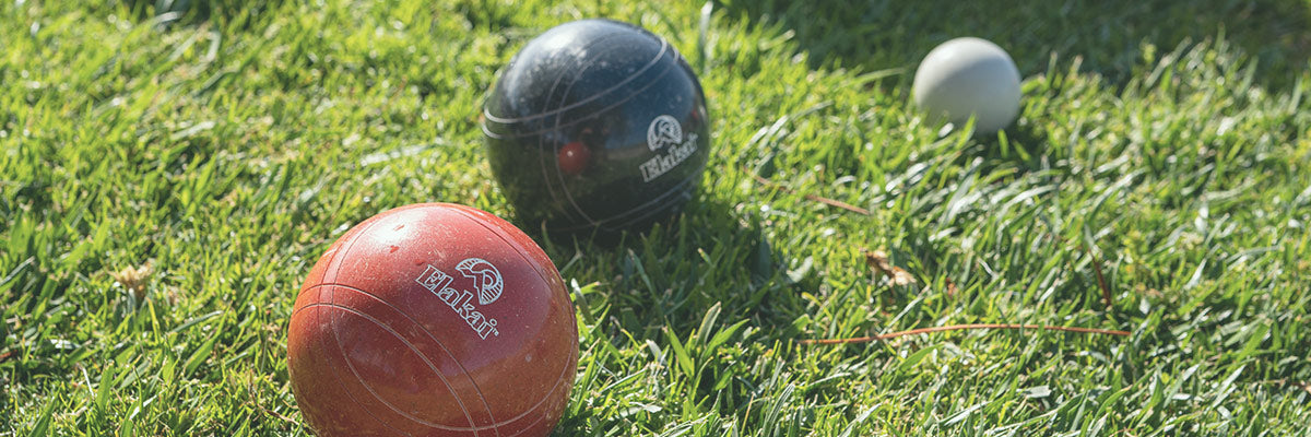 bocce ball set up on grass