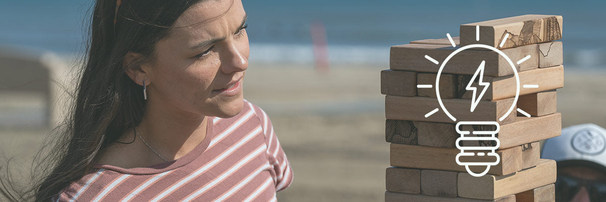woman playing wooden block game trivia