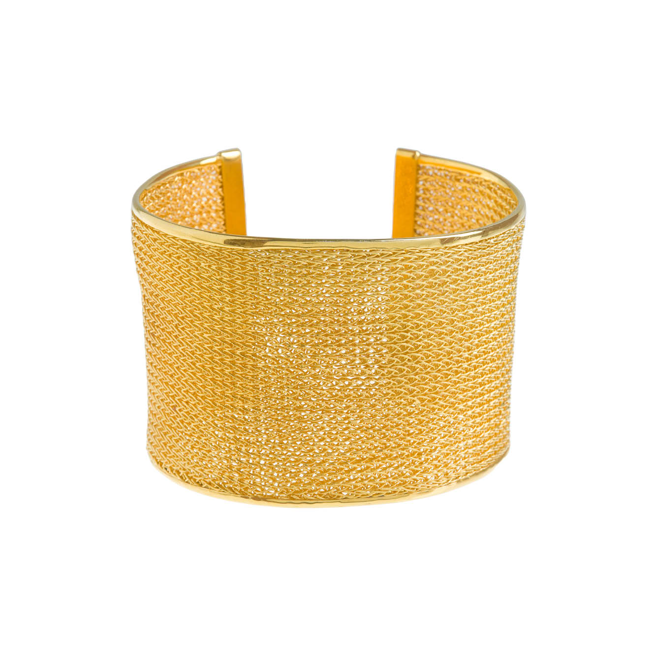 Large Gold Wedding Cuff made out of woven wire on a white background