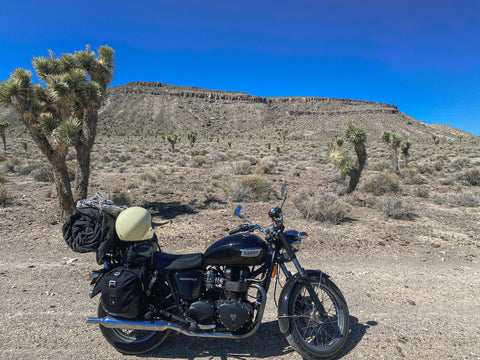 Motorcycle on the side of the road in the desert