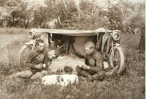 Old Harley Davidson riders moto-packing in the 1900s.