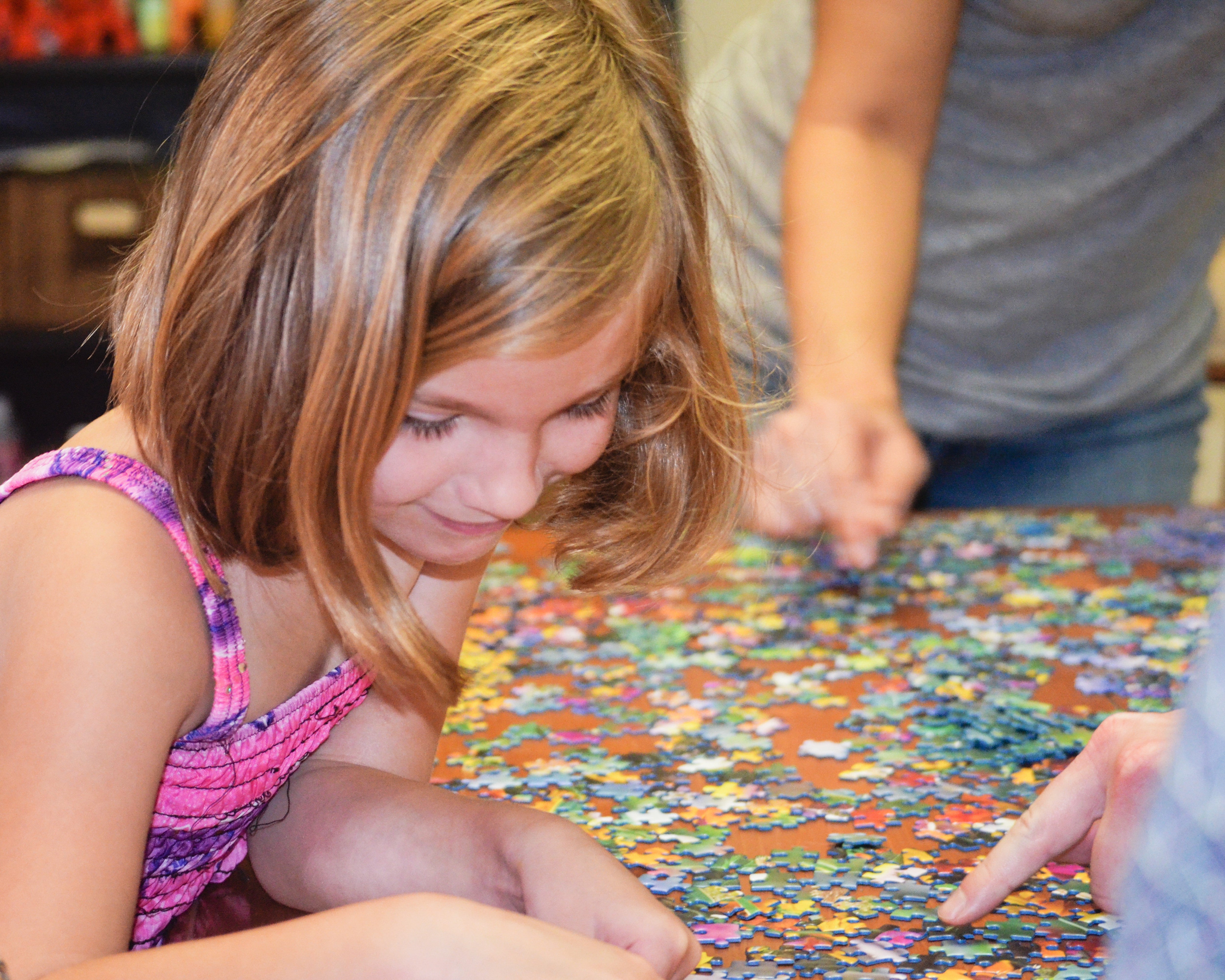 Kid playing jigsaw puzzle-Shaka Tribe