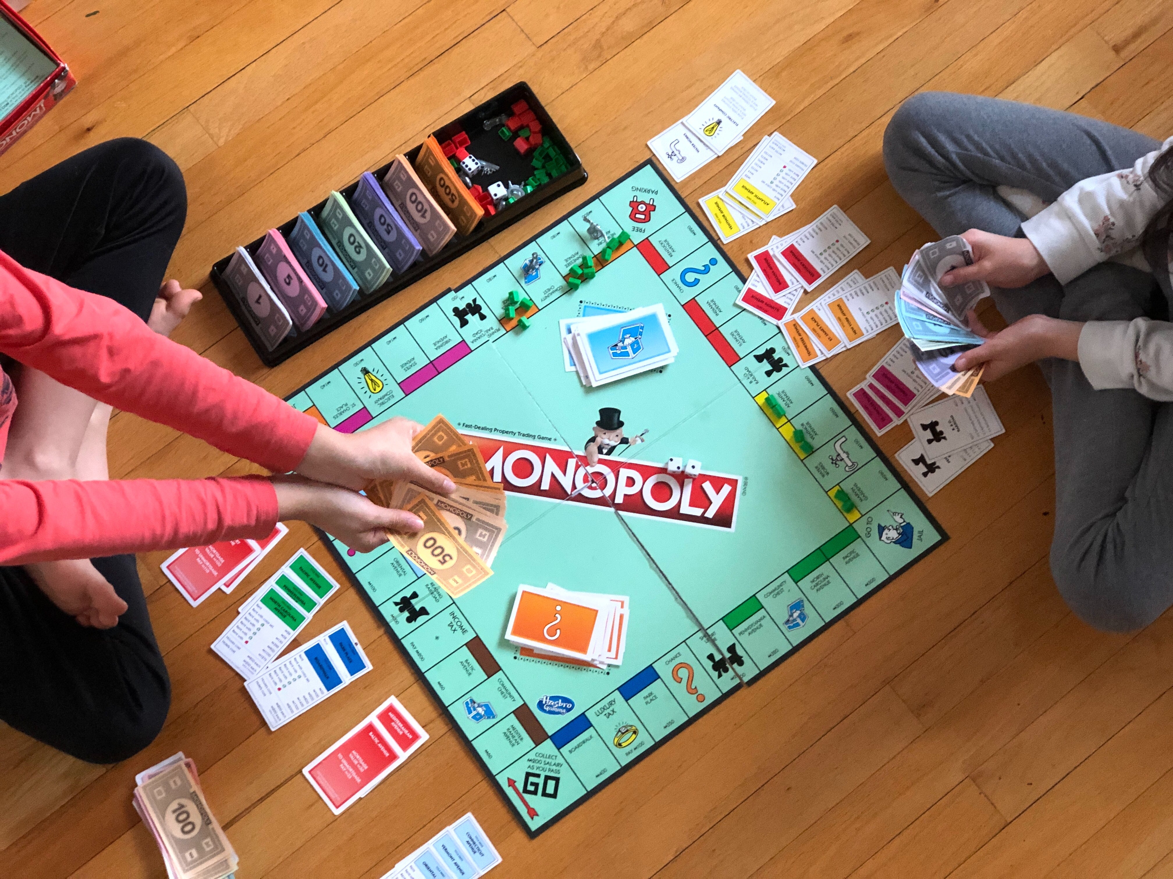 Kid playing monopoly