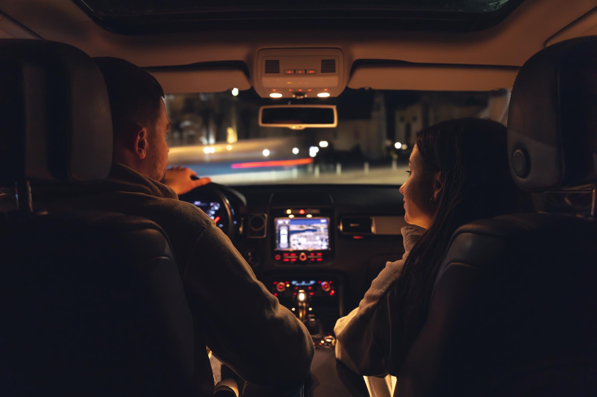 man-woman-car-night-view-from-car