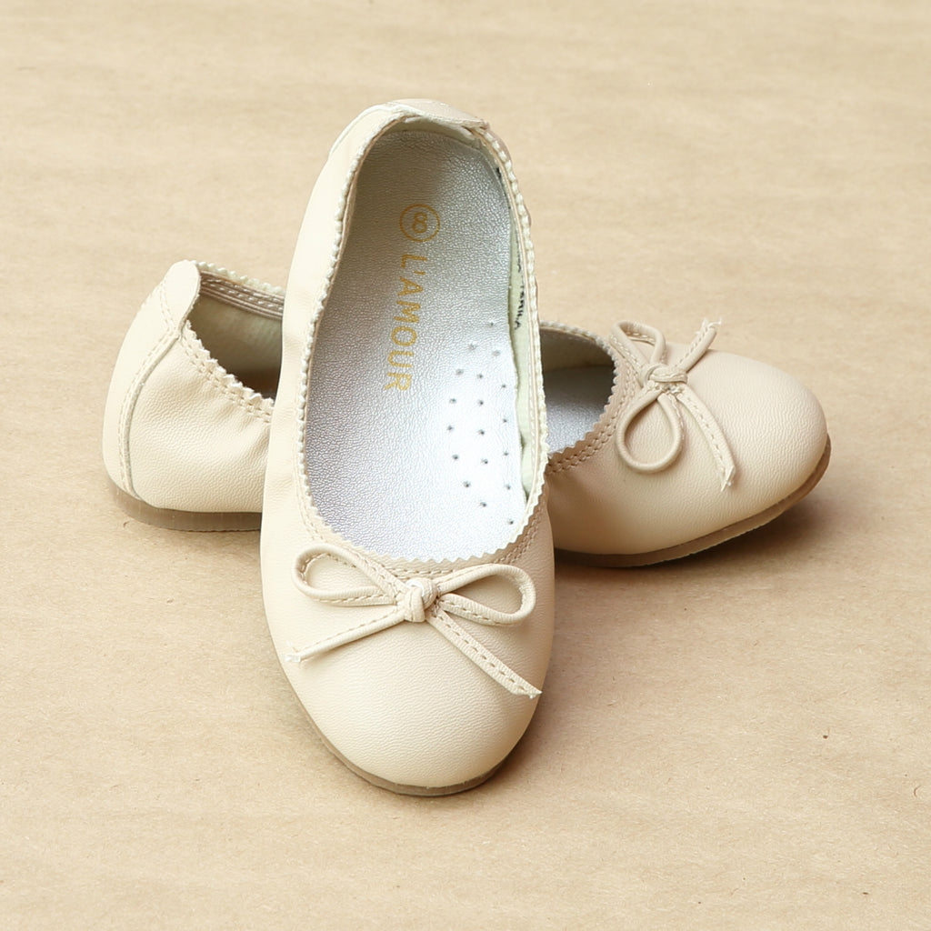 girls cream ballet shoes