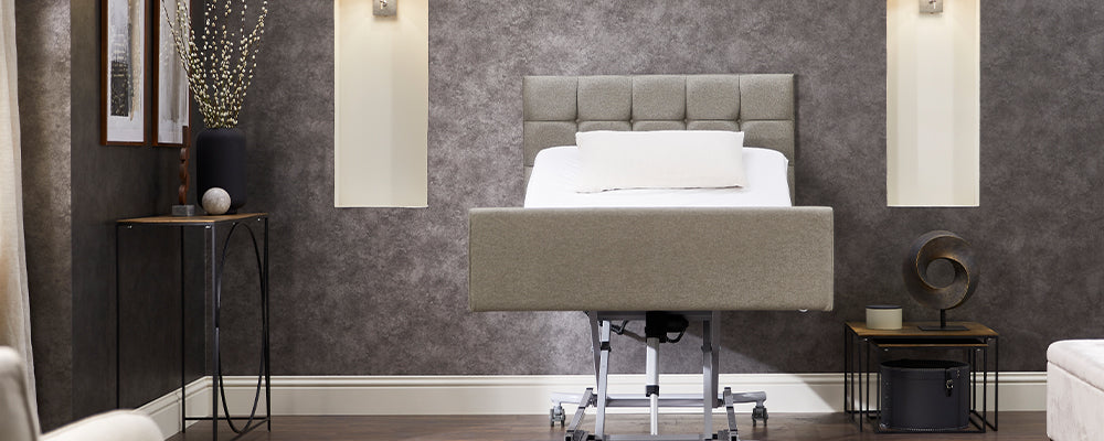 A head on view of the Opera Signature Comfort Profiling Bed in it's highest position with the backrest raised up