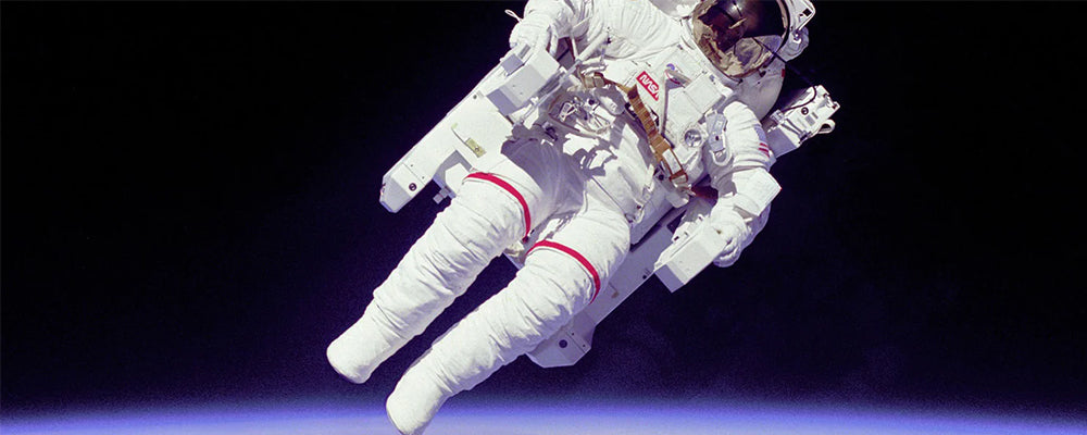 a person flouting in space to show zero gravity