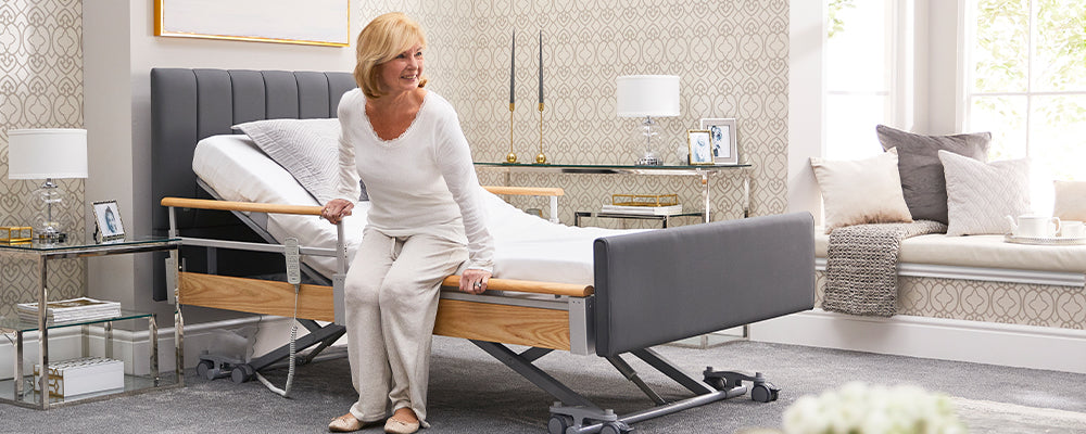 Woman with blonde hair getting out of an opera profiling bed