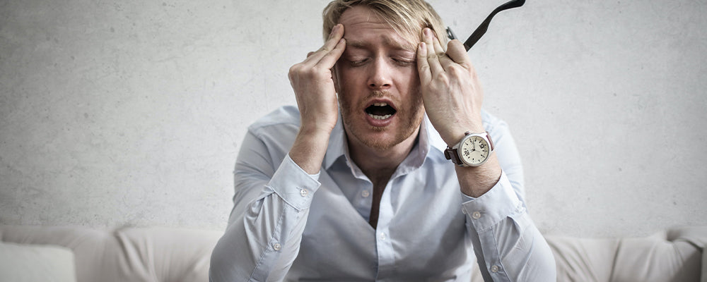 A man looking very stressed