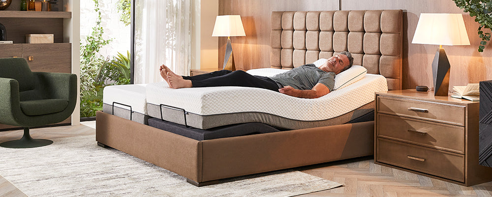 an electric bed with a man laying on it 