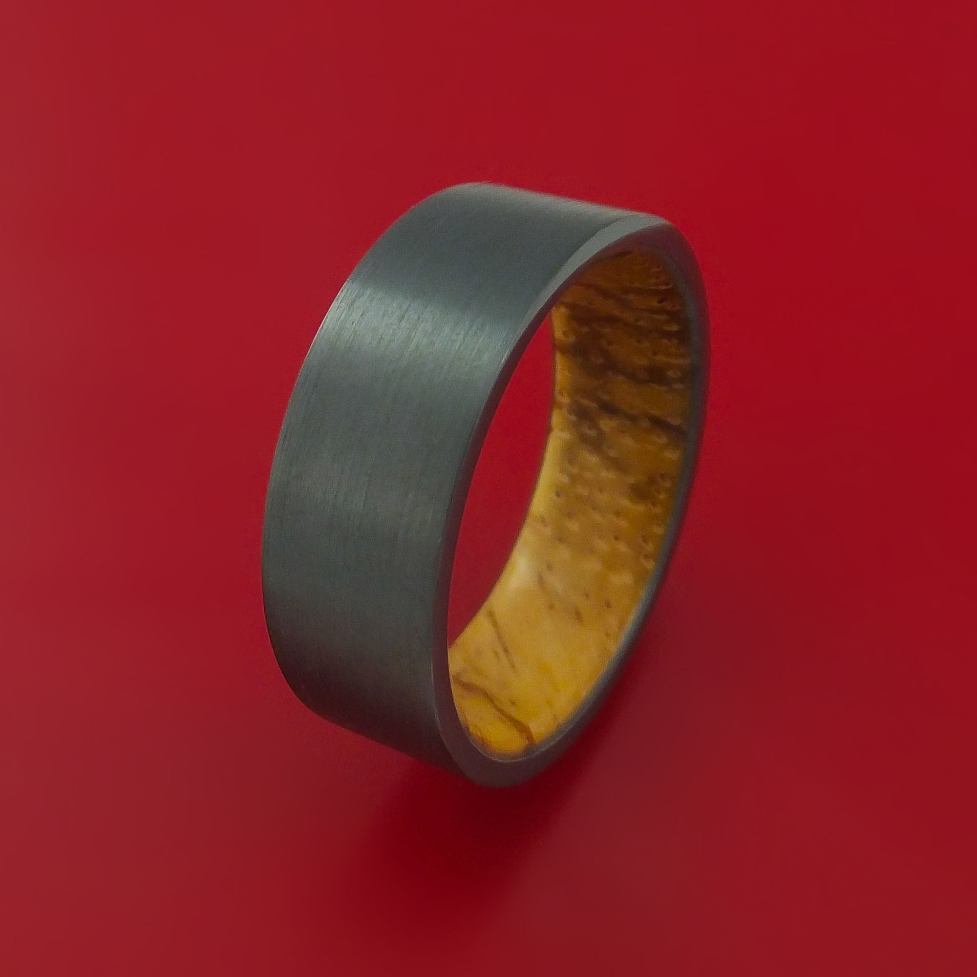 Black Zirconium Ring with Interior Hardwood Sleeve Custom