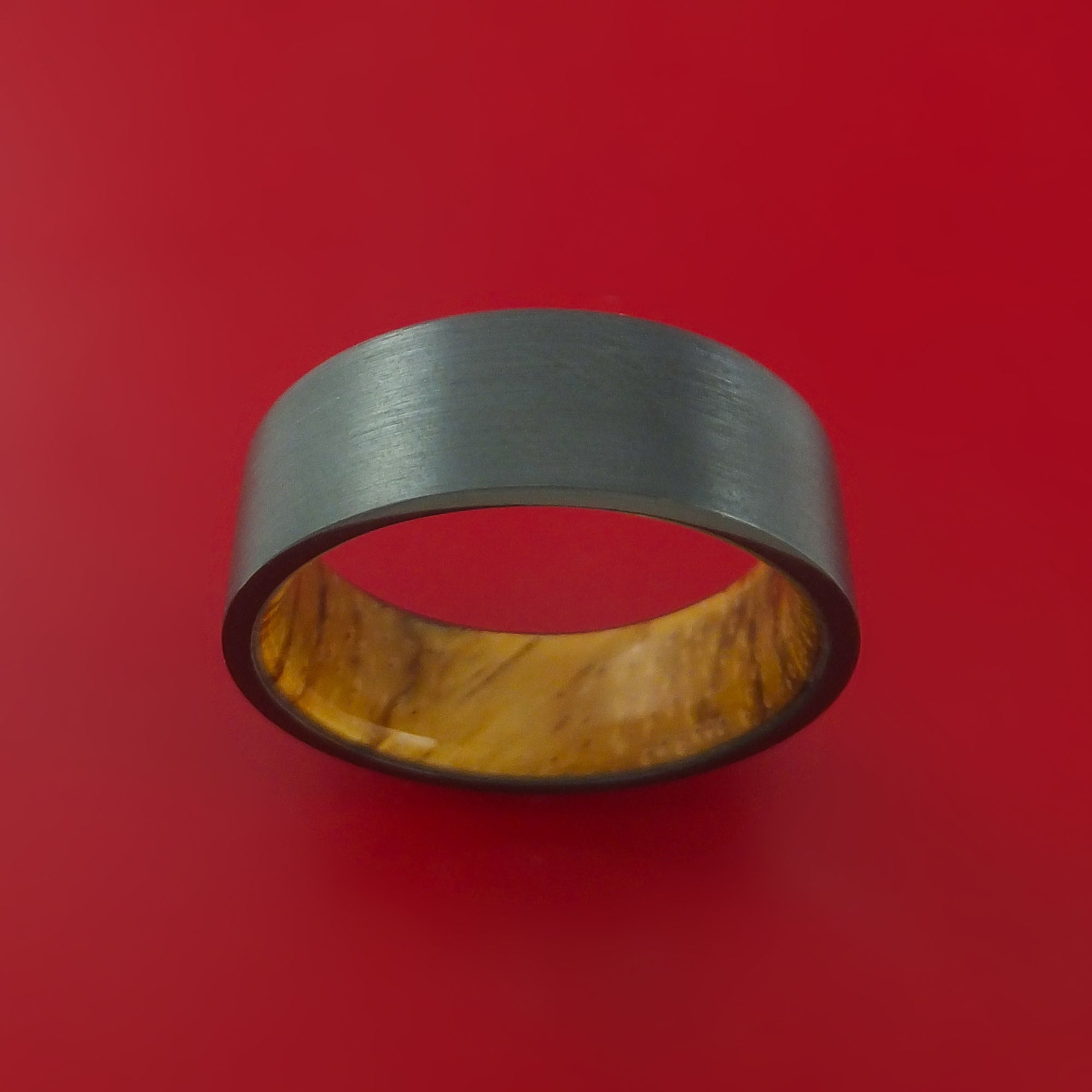 Black Zirconium Ring with Interior Hardwood Sleeve Custom