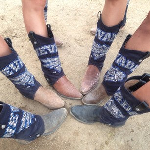 cowgirl boots in a circle, all with UNR cowboy boot covers