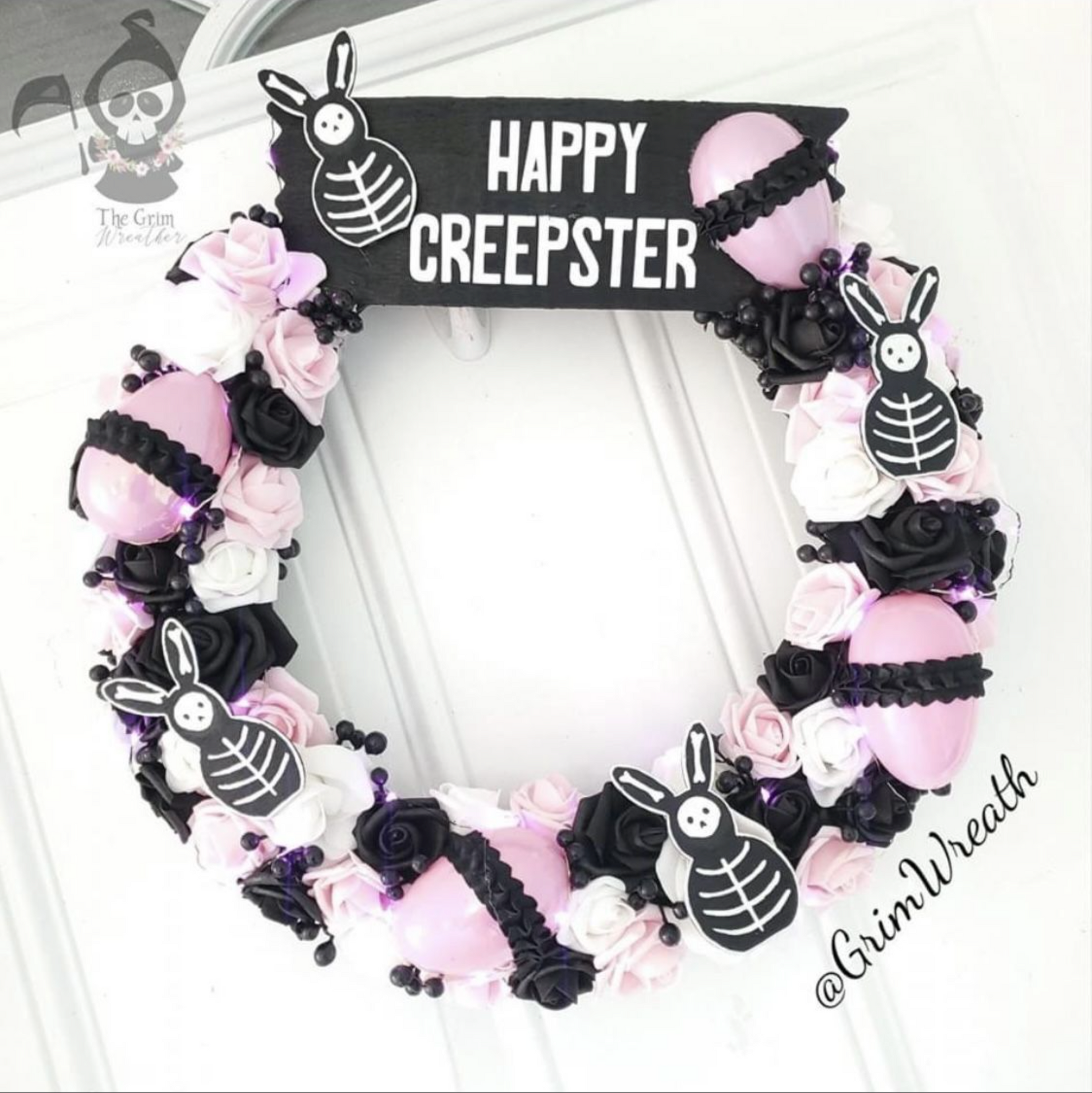 Happy Creepster themed pastel goth spooky style easter wreath handmade by the grim wreather for easterween easter-ween spooky easter halloween.