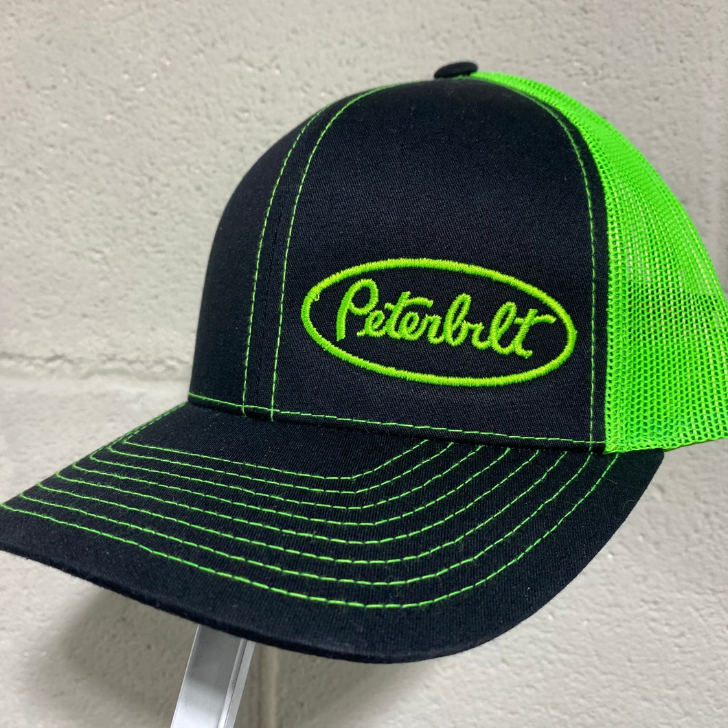 green and black trucker hat