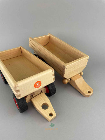 Fagus wooden toys dump trailer and container tipper trailer comparison - front view