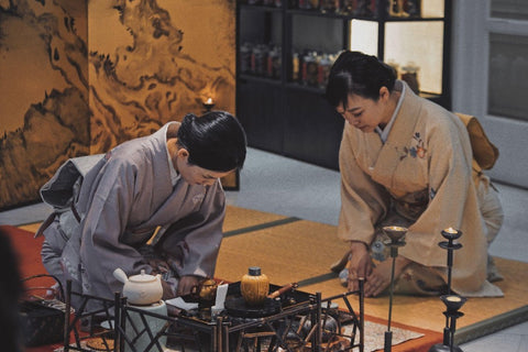 Two Women Bow in Japanese Tea Ceremony