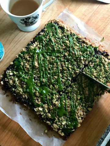 Cutting into a delicious cookie bar that's gluten free and vegan! Meet your matcha green tea dessert of choice