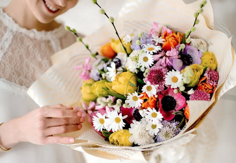 "Bouquet of beautiful mix flowers hand-tied."
