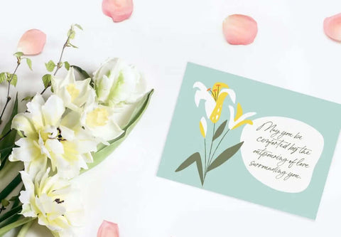 "Bouquet of white flowers, symbolizing sympathy and condolence."