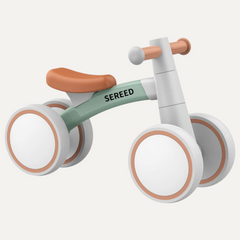 Splurge-worthy balance bike, a memorable and developmental Christmas gift for the walking toddler.