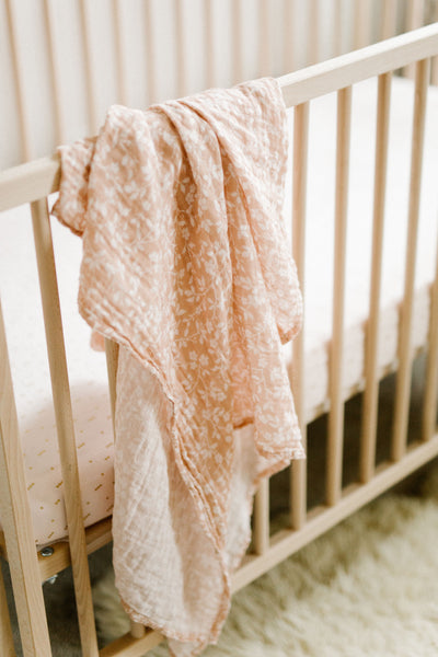 baby crib, crib mattress and baby blanket