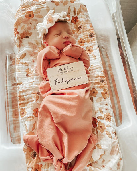 a newborn girl photo in a sunflower baby blanket