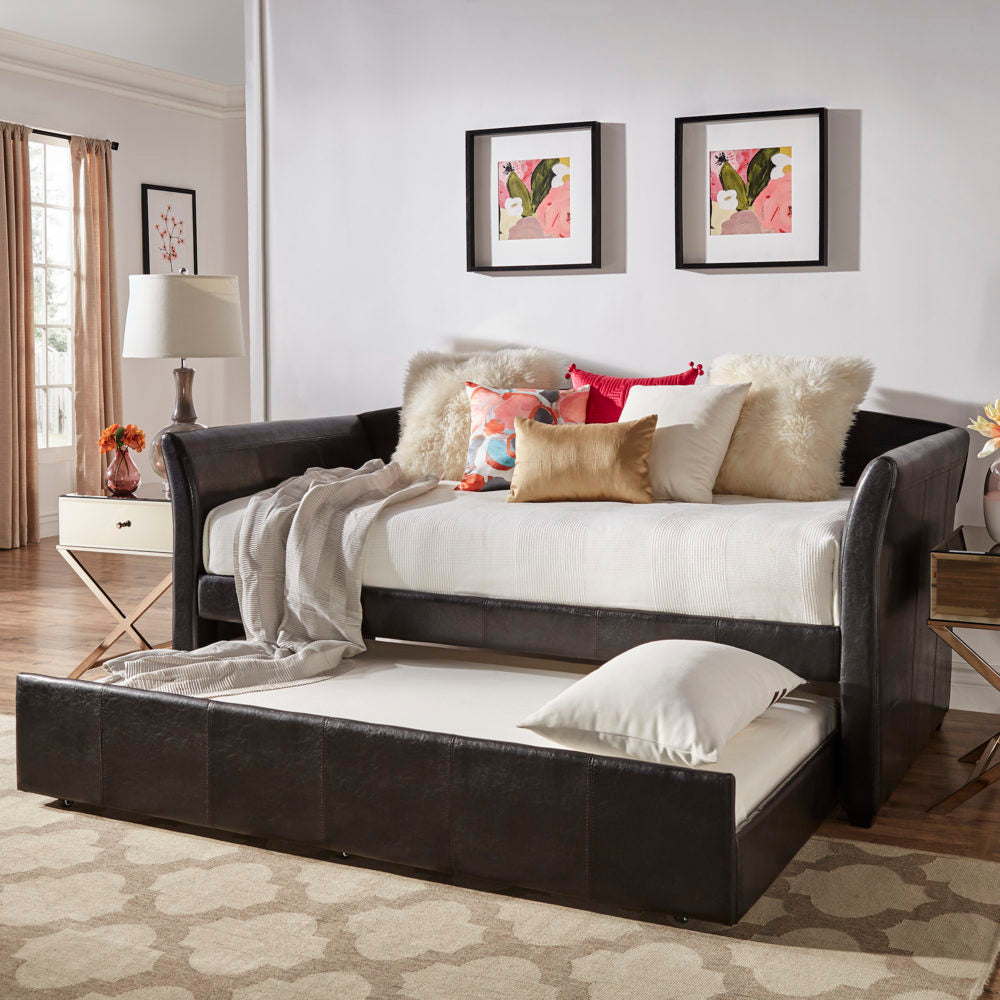 Another one of our tips and tricks for Airbnb hosts is all about multifunctionality. And there is nothing more multifunctional than the iNSPIRE Q black faux leather upholstered day bed with pulled out trundle.