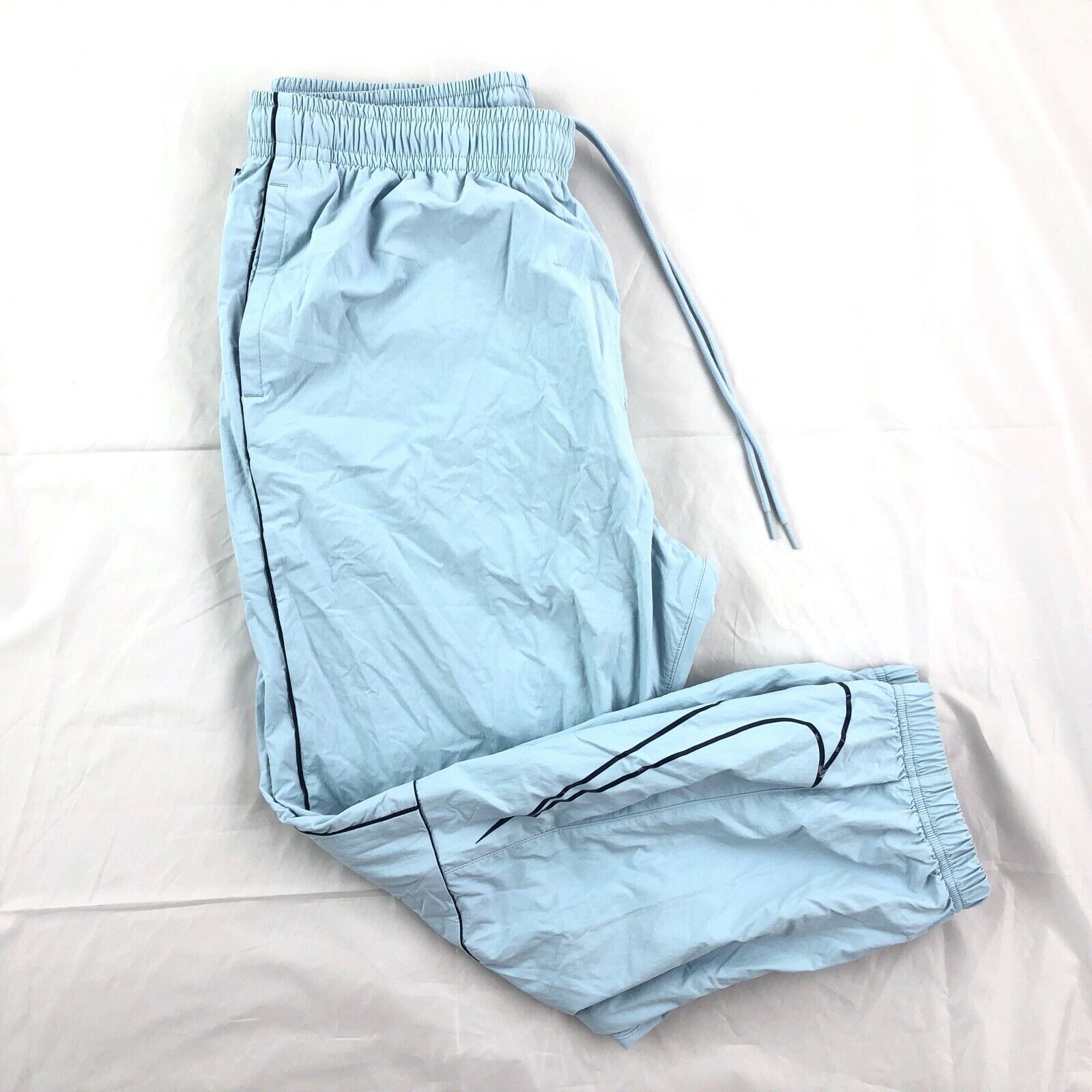 nike sb swoosh track pants blue