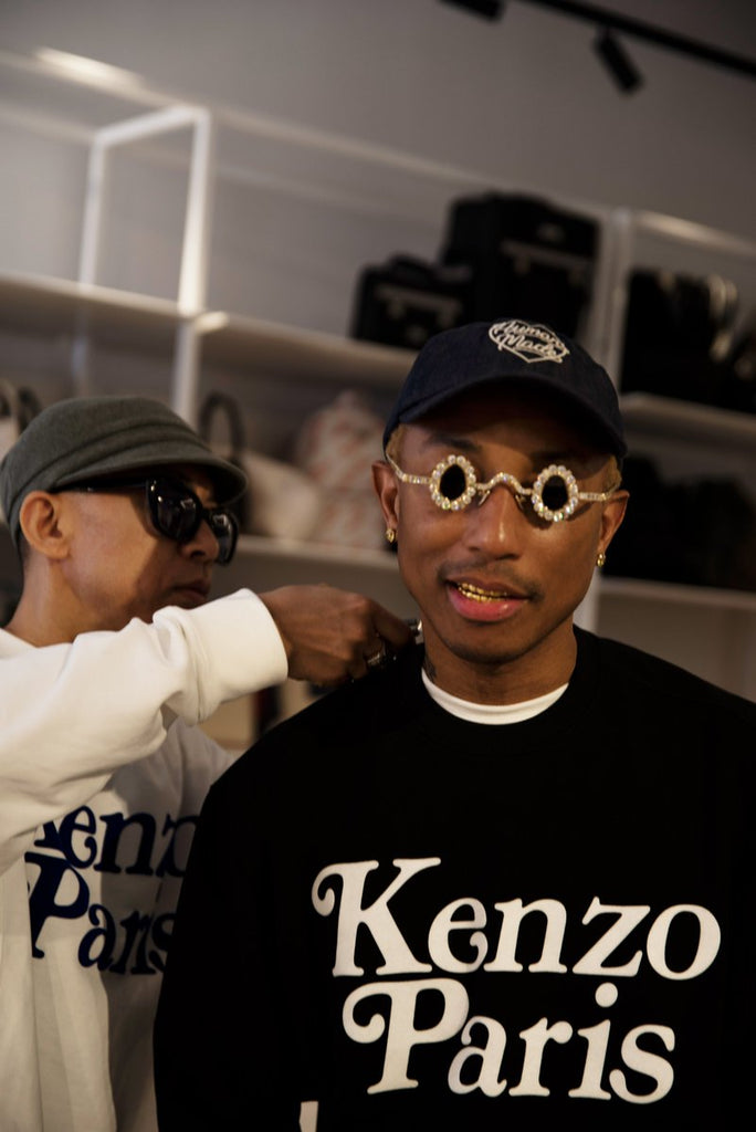 Kenzo x Verdy Collection SS24. Behind-the-scenes image of Nigo and Pharrell Williams wearing the Black Classic Sweatshirt