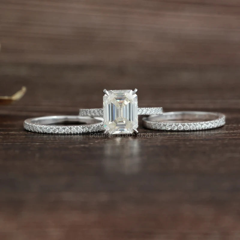 3.20 carat emerald cut moissanite bridale set with two separate eternity band in white gold