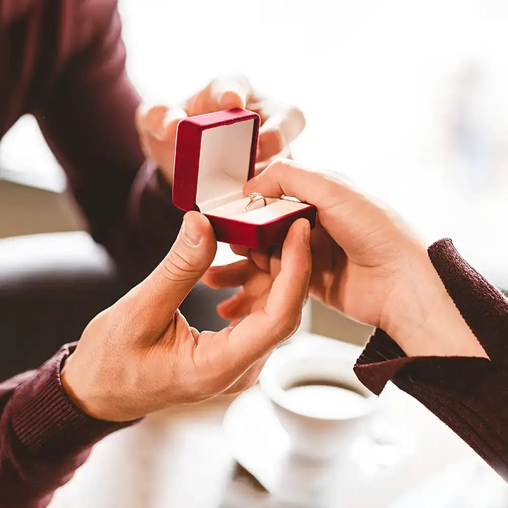 Offering a wedding ring with the love