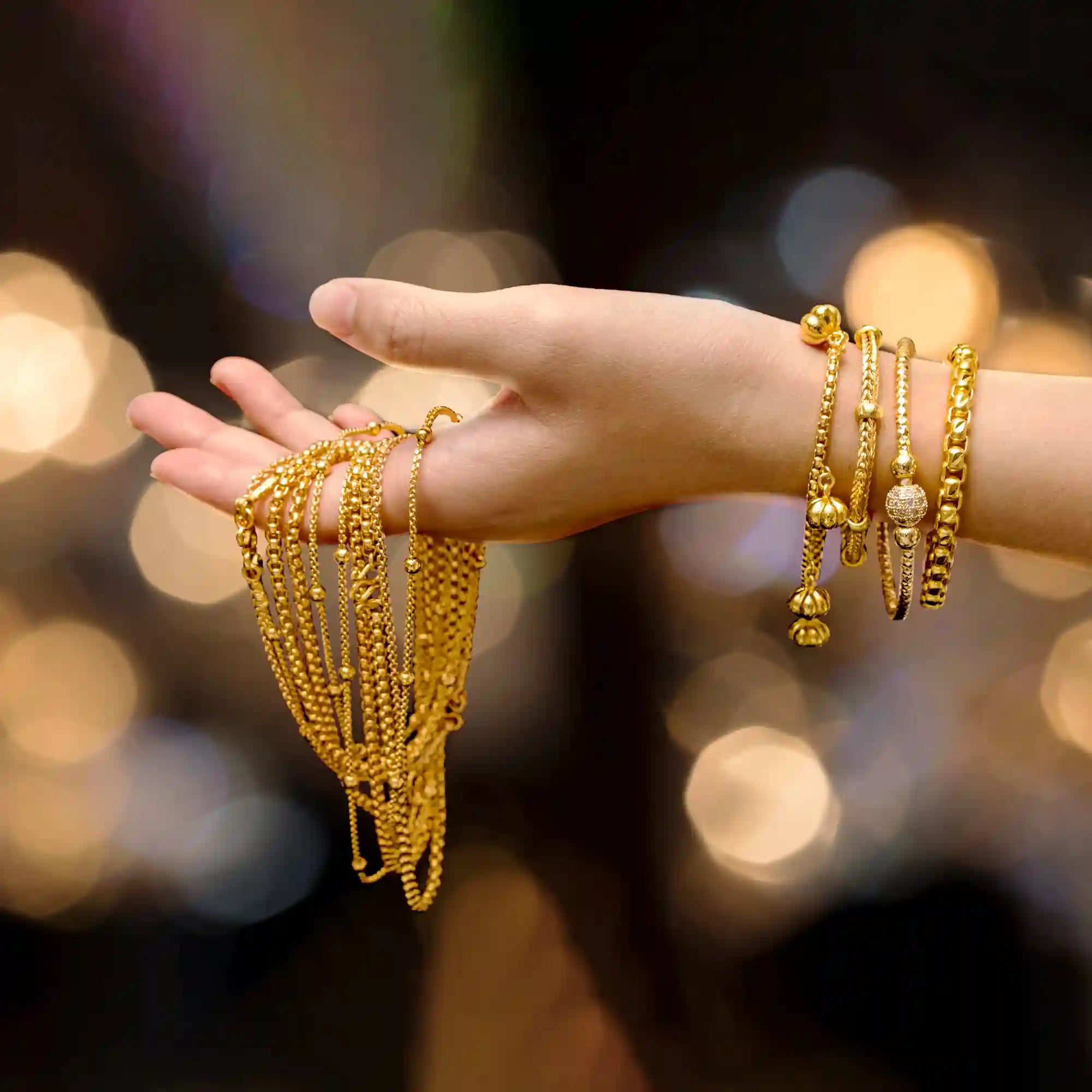 Women's gold jewelry as bracelet, bangles, necklace and charming tennis chains with precious designs