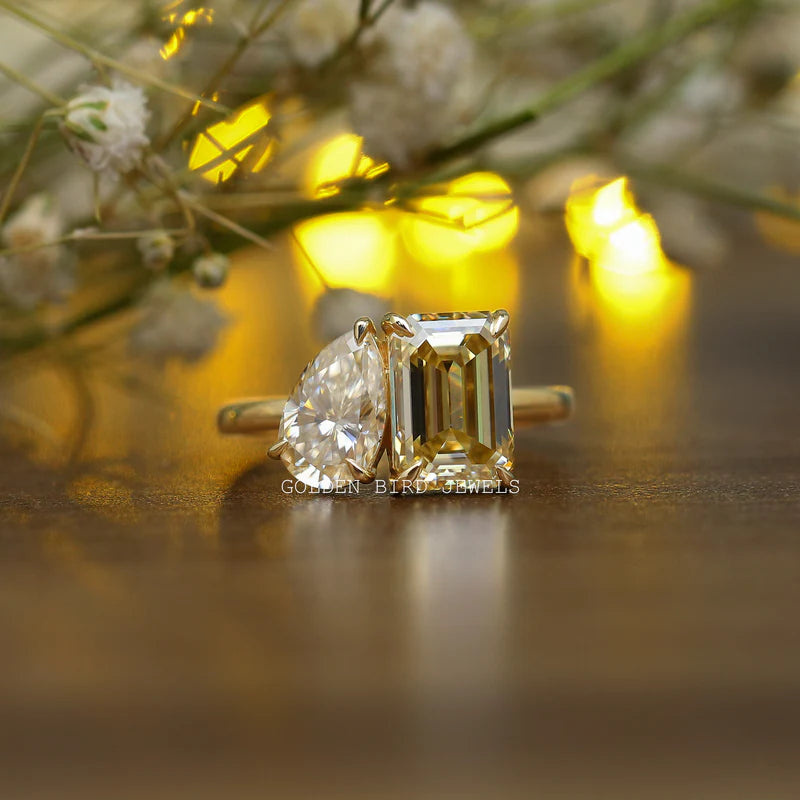Yellow Gold Toi et Moi ring with pear and yellow champagne emerald cut Moissanite