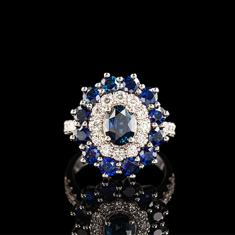 Antique halo sapphire gemstone ring with a white colored diamonds