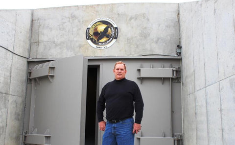 man in front of bunker